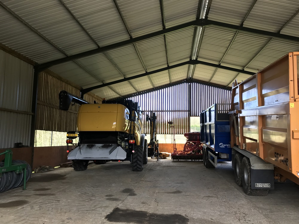 Tractor inside a large shed
